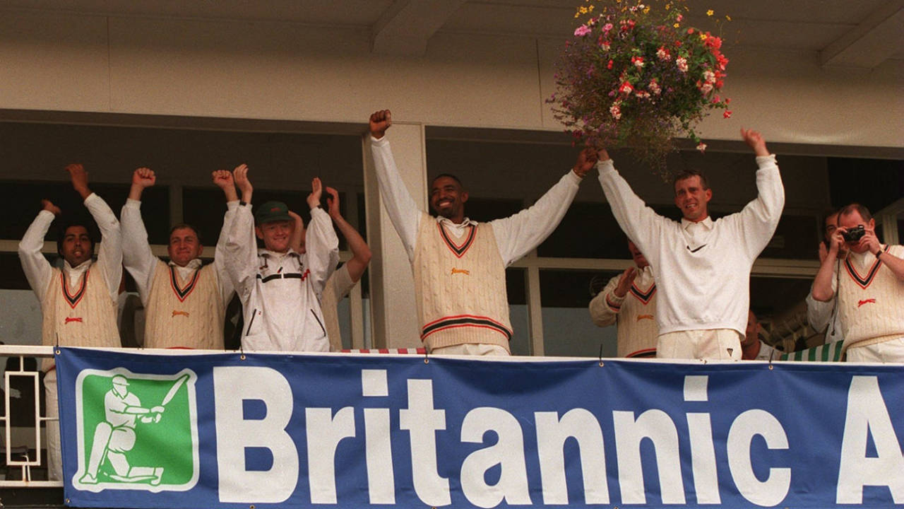 Leicestershire's celebrate news of their title on the balcony at Grace Road&nbsp;&nbsp;&bull;&nbsp;&nbsp;Allsport/Getty Images