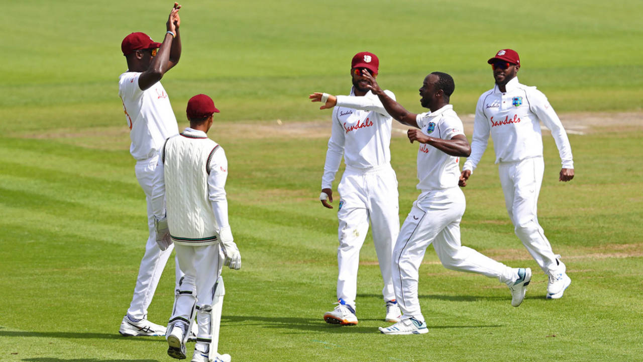 Kemar Roach celebrates with his team-mates, England v West Indies, 3rd Test, Old Trafford, 1st day, July 24, 2020