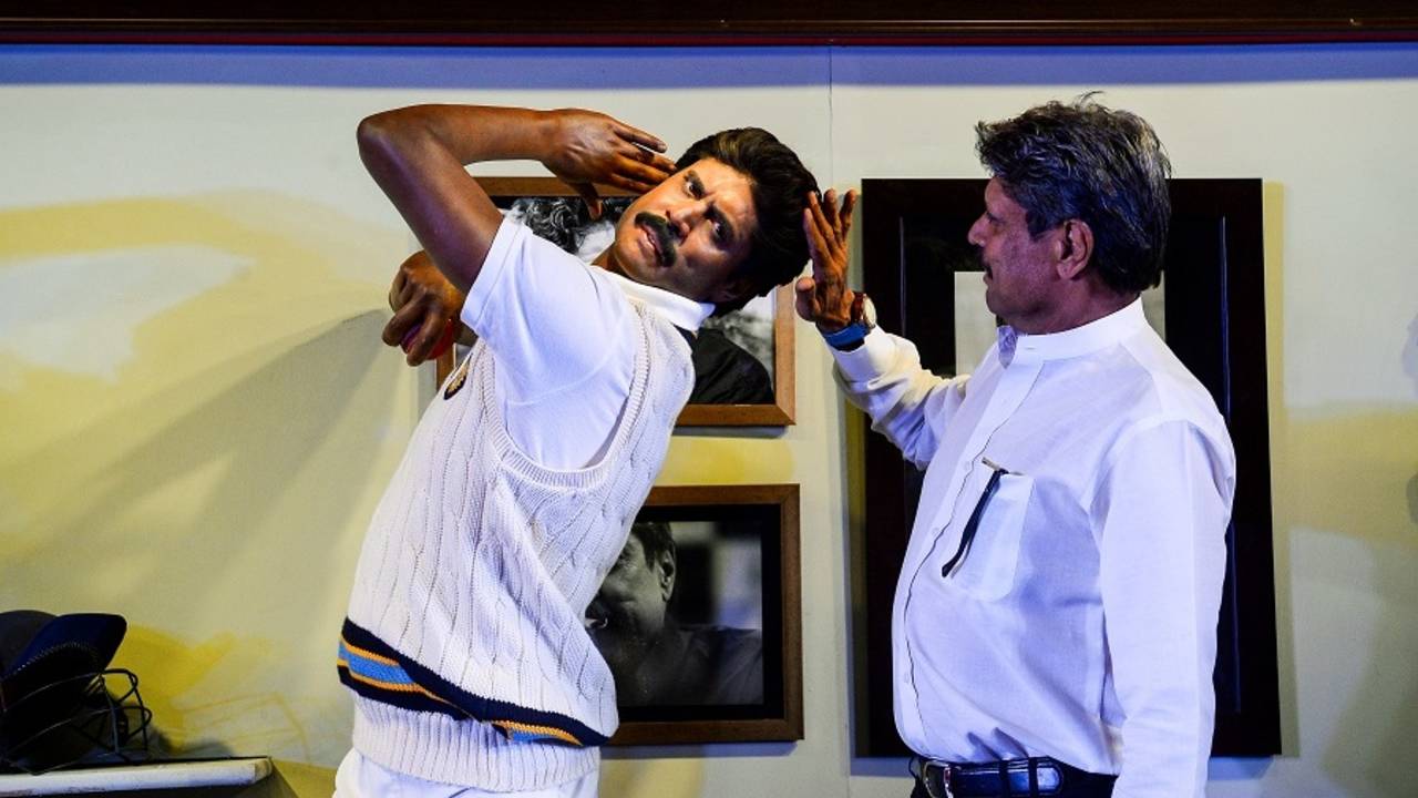 Kapil Dev admires his likeness at the Delhi launch of a Madame Tussauds museum, Delhi, May 11, 2017