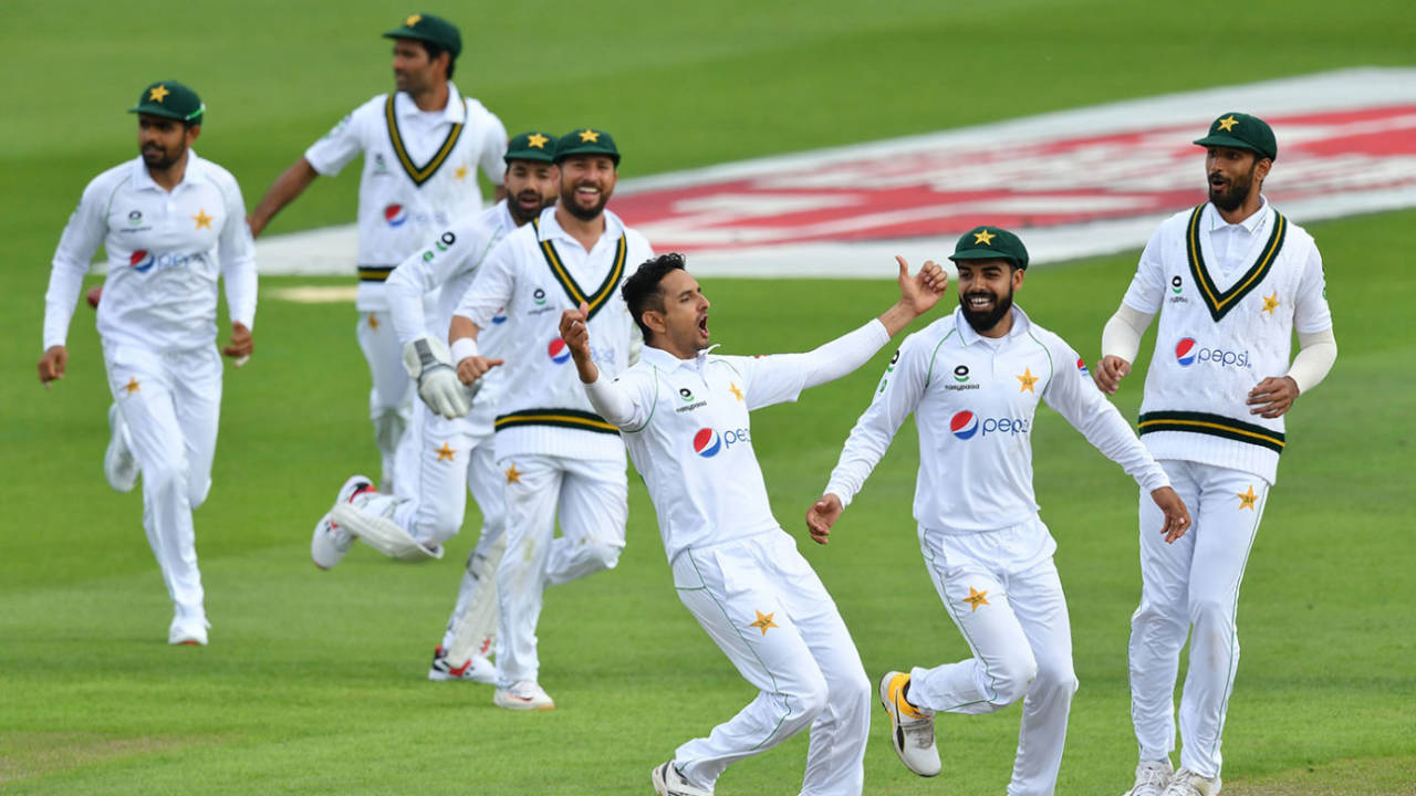 Mohammad Abbas is engulfed by his team-mates after bowling Ben Stokes, England v Pakistan, 1st Test, Old Trafford, 2nd day, August 6, 2020
