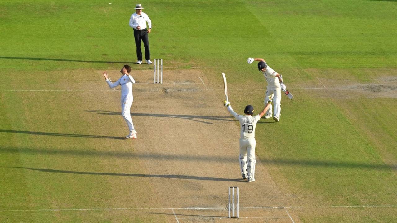 Chris Woakes and Dom Bess celebrate as England win the first Test, England v Pakistan, 1st Test, Old Trafford, 4th day, August 8, 2020