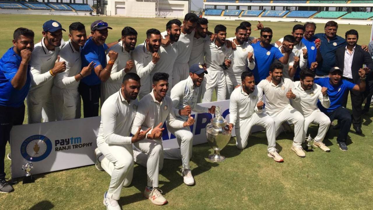 The Saurashtra players pose with the Ranji Trophy, Saurashtra v Bengal, final, Ranji Trophy 2019-20, 5th day, Rajkot, March 13, 2020