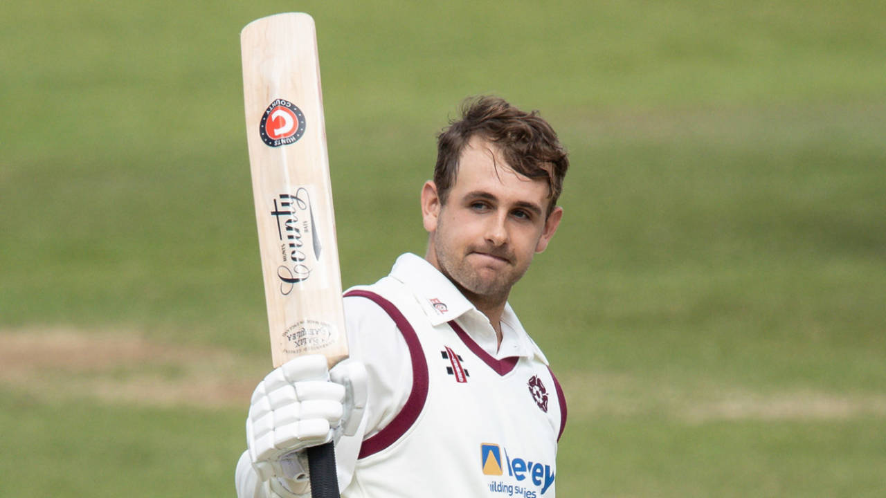 Charlie Thurston acknowledges the applause from his team-mates on reaching his century, day two, Bob Willis Trophy, Northamptonshire v Glamorgan at The County Ground, August 23, 2020
