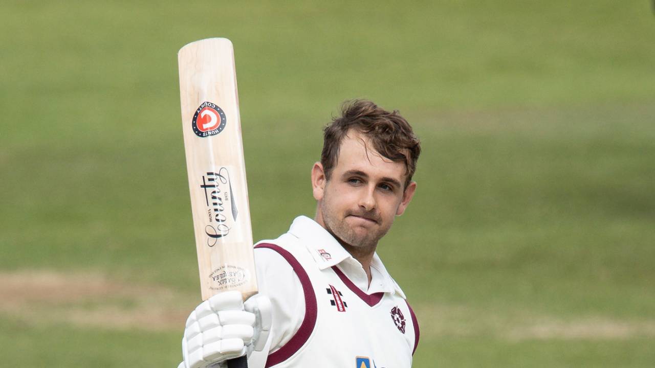 Charlie Thurston acknowledges the applause from his team-mates on reaching his century, day two, Bob Willis Trophy, Northamptonshire v Glamorgan at The County Ground, August 23, 2020