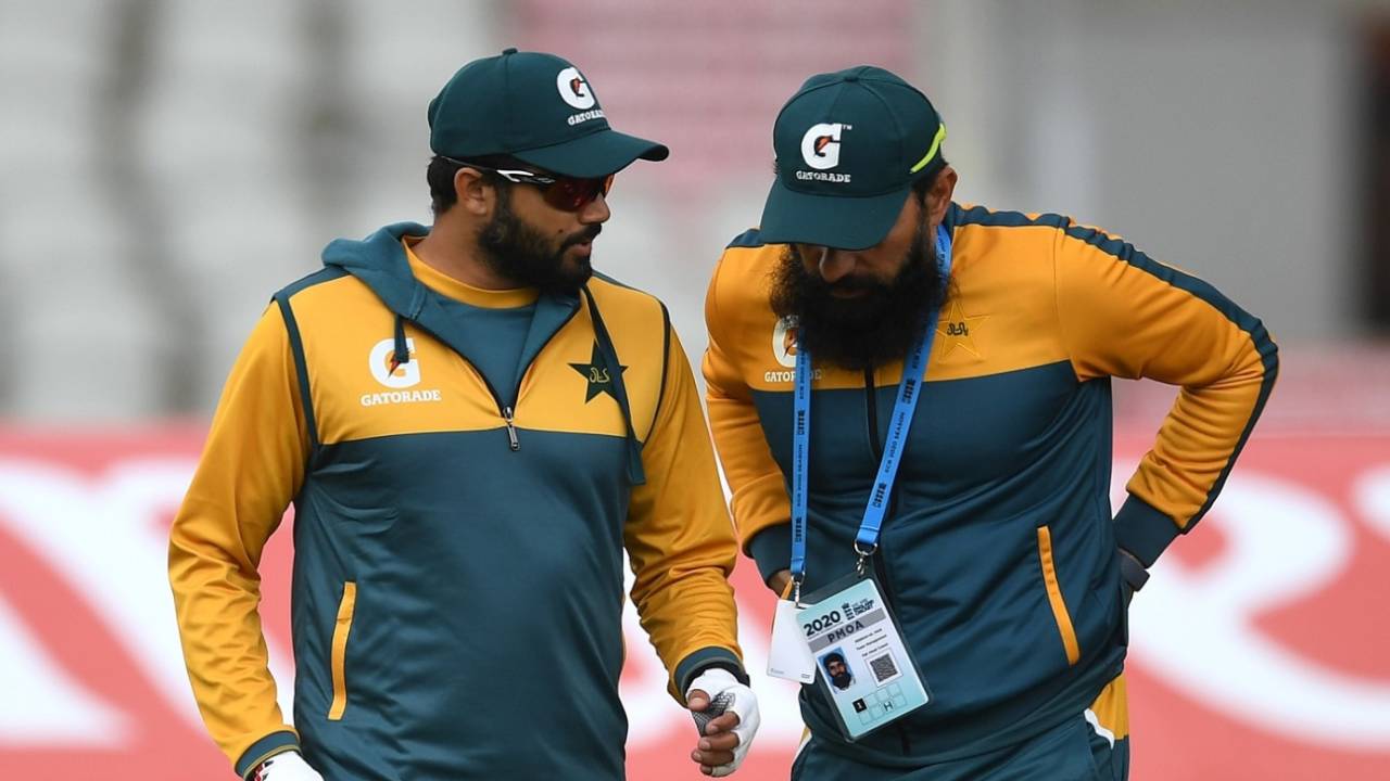 Azhar Ali and Misbah-ul-Haq catch up during a training session
