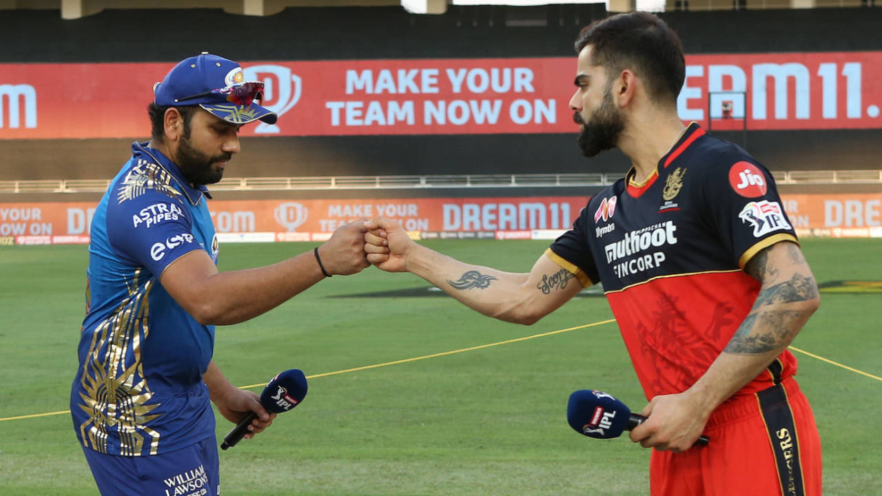 Rohit Sharma and Virat Kohli fist-bump at the toss, Mumbai Indians v Royal Challengers Bangalore, IPL 2020, Dubai, September 28, 2020