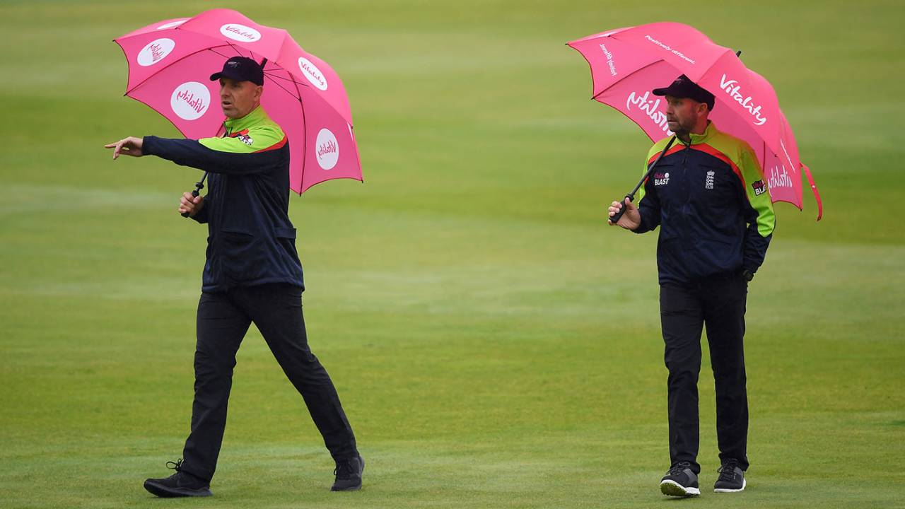 Umpires Alex Wharf and Mike Burns carry out an inspection, Surrey vs Gloucestershire, Vitality Blast semi-final, Edgbaston, October 4, 2020