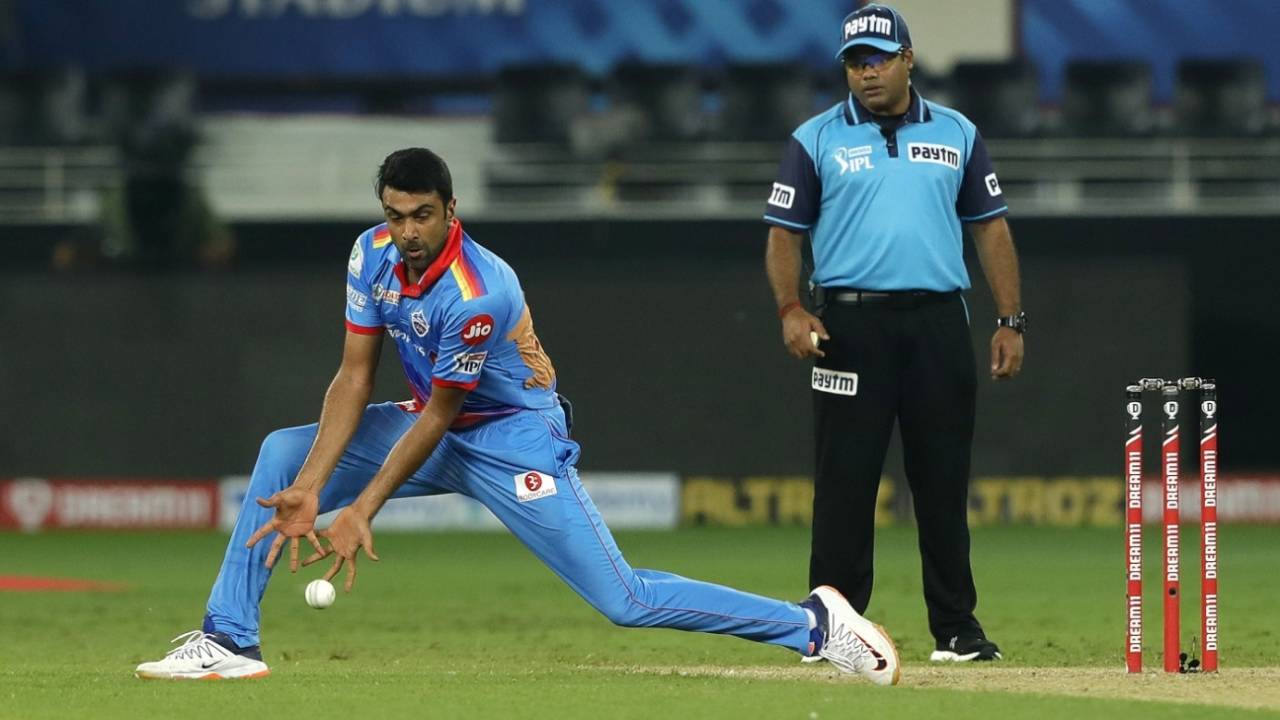 R Ashwin collects the ball in his followthrough, Dehli Capitals vs Royal Challengers Bangalore, IPL 2020, Dubai, October 5, 2020