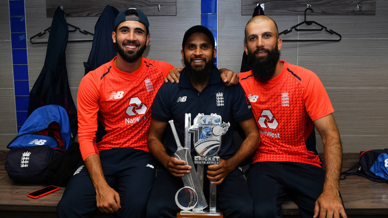 Saqib Mahmood, Adil Rashid and Moeen Ali pose with the silverware after their 2-1 series victory, South Africa v England, 3rd T20I, Centurion, February 16, 2020