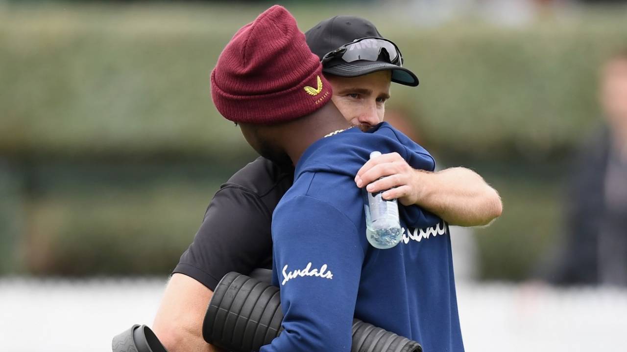 Kemar Roach, seen here getting a hug from Kane Williamson, lost his father in the 48 hours before the match&nbsp;&nbsp;&bull;&nbsp;&nbsp;Getty Images