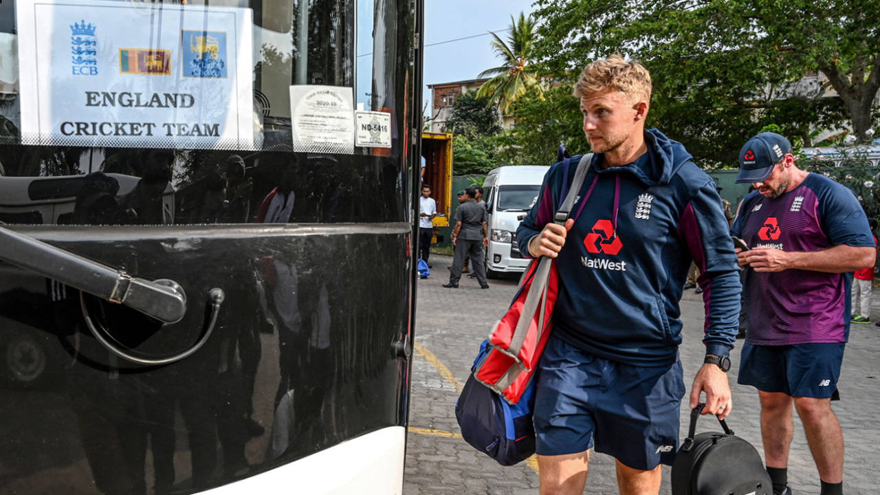 Joe Root heads for the team bus after England's tour match in Sri Lanka came to a premature end