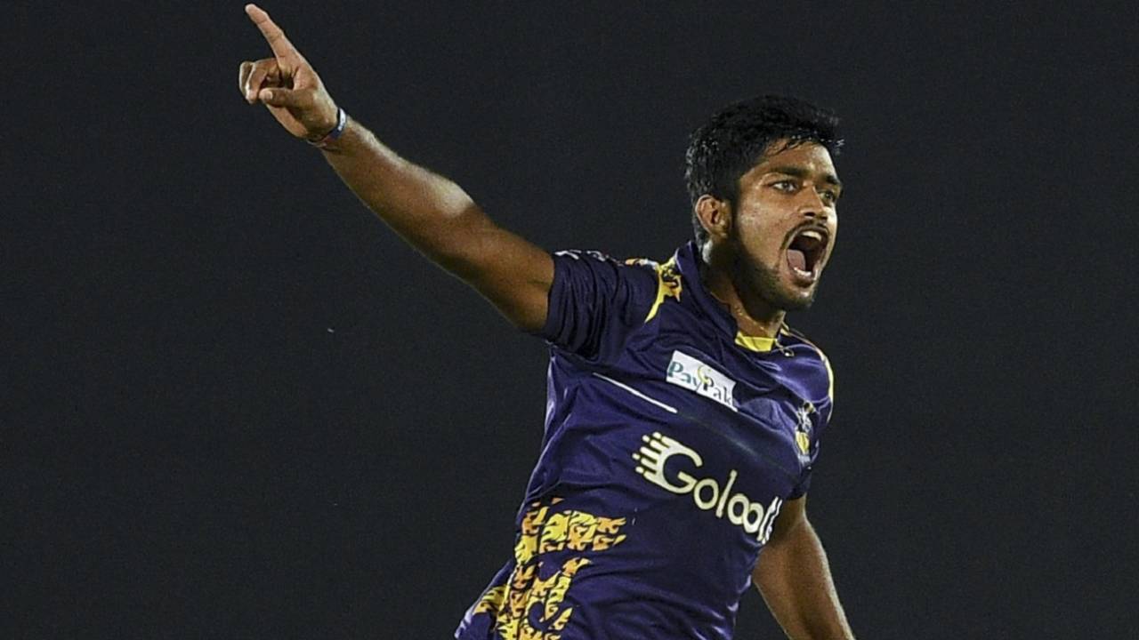 Dhananjaya Lakshan wheels away after taking a wicket&nbsp;&nbsp;&bull;&nbsp;&nbsp;AFP