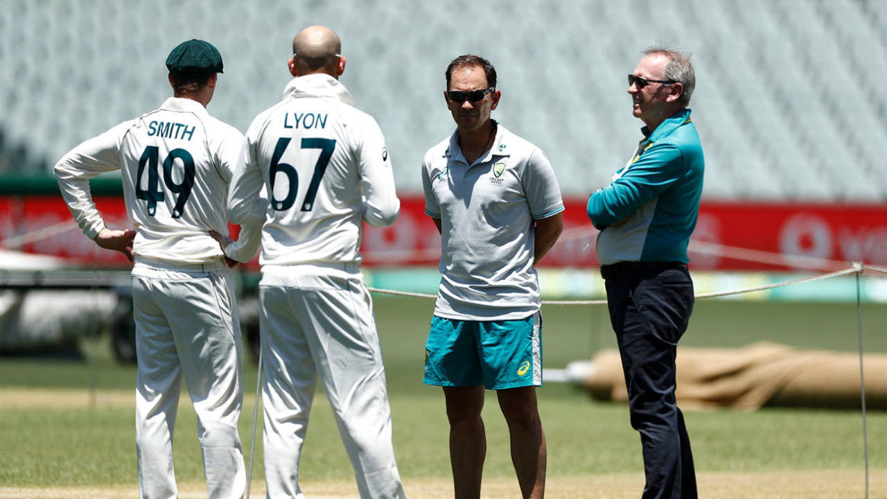 Justin Langer and national selector Trevor Hohns chat with Steven Smith and Nathan Lyon, Adelaide, December 15, 2020