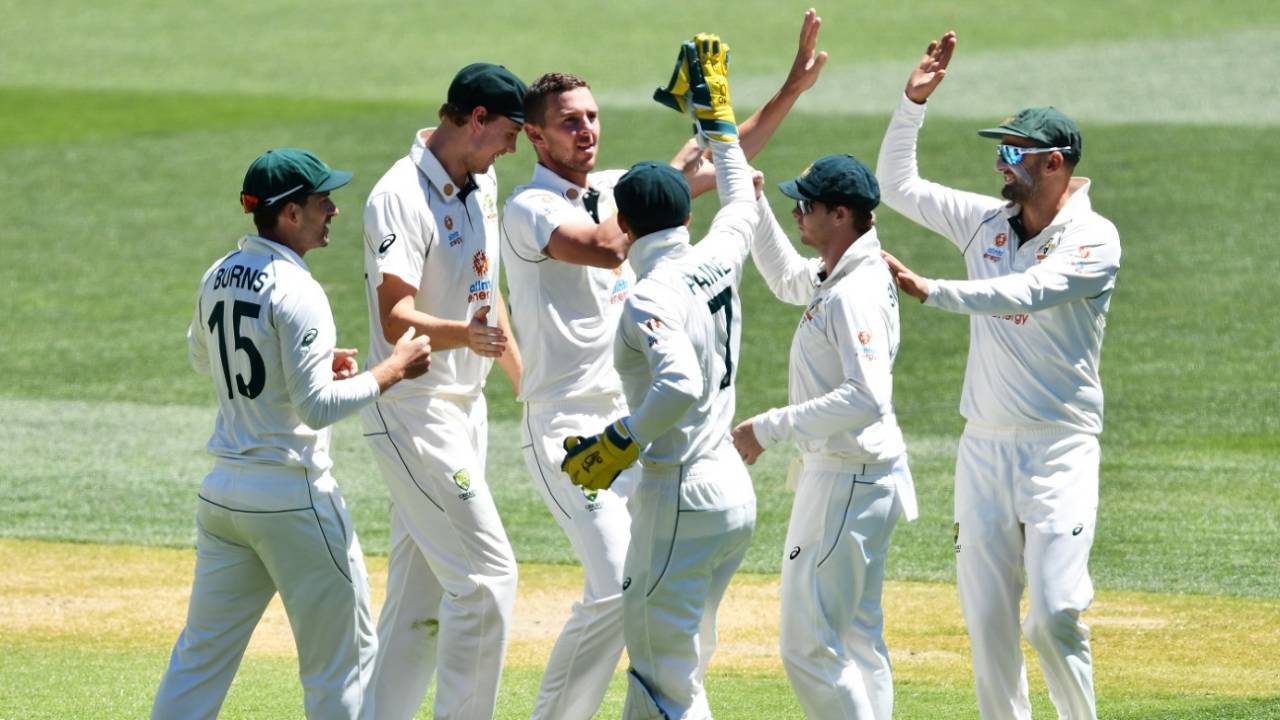 A jubilant Josh Hazlewood is congratulated by team-mates after his devastating strikes, Australia vs India, 1st Test, Adelaide, 3rd day, December 19, 2020