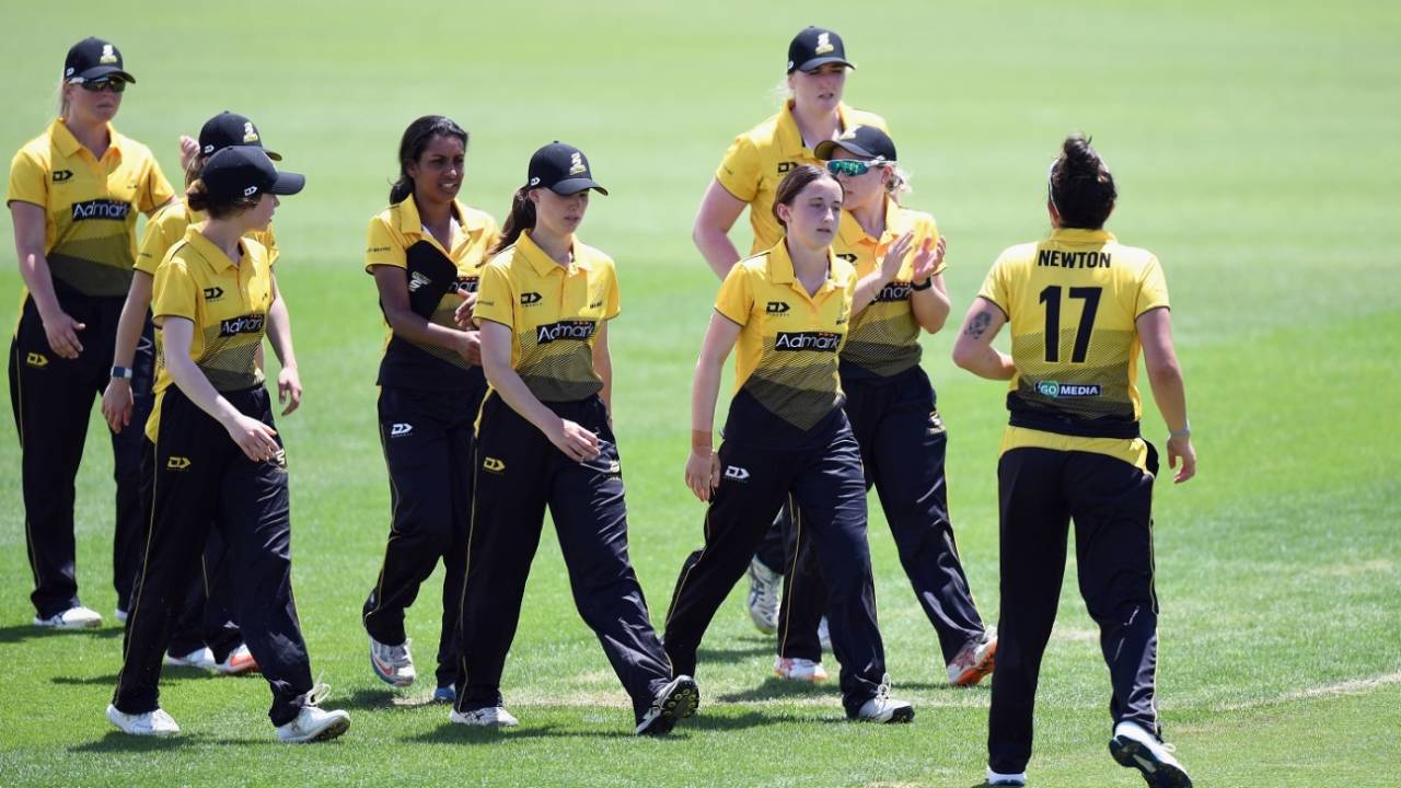 Kate Chandler is congratulated by her team-mates after completing her five-for, Canterbury women vs Wellington women, Hallyburton Johnstone Shield, Christchurch, December 19, 2020