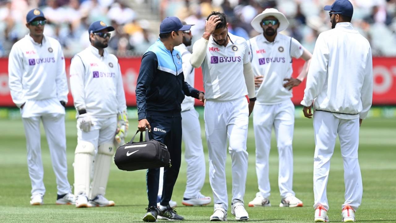 Worried Indian faces all around as Umesh Yadav goes off the field&nbsp;&nbsp;&bull;&nbsp;&nbsp;Getty Images