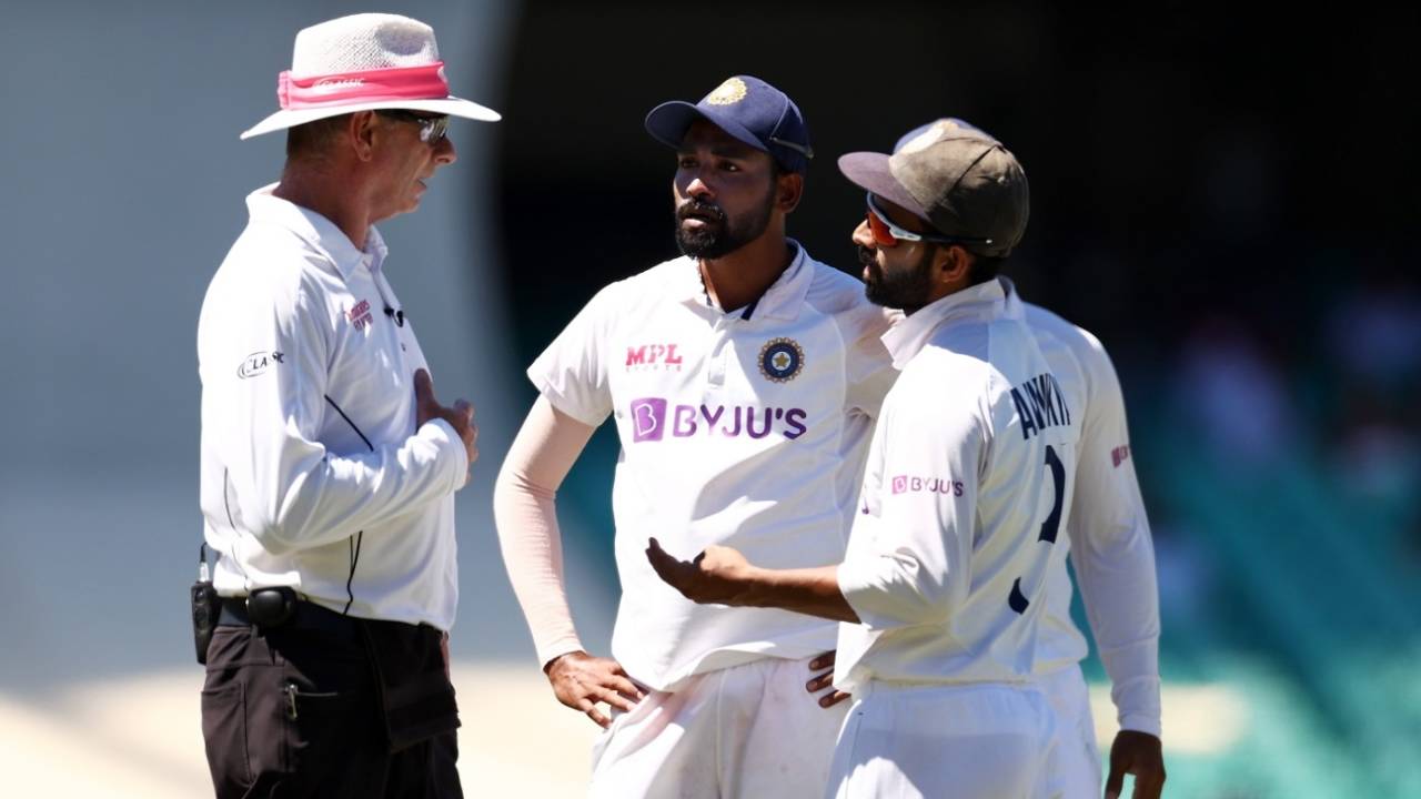 Mohammed Siraj and Ajinkya Rahane talk to umpire Paul Reiffel after spectators in the stands at SCG heckled Siraj, Australia vs India, 3rd Test, Sydney, 4th day, January 10, 2021
