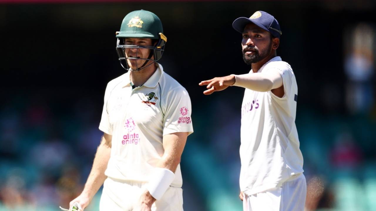 Tim Paine looks on as Mohammed Siraj points in the direction from where spectators directed abuse at him, Australia vs India, 3rd Test, Sydney, 4th day, January 10, 2021