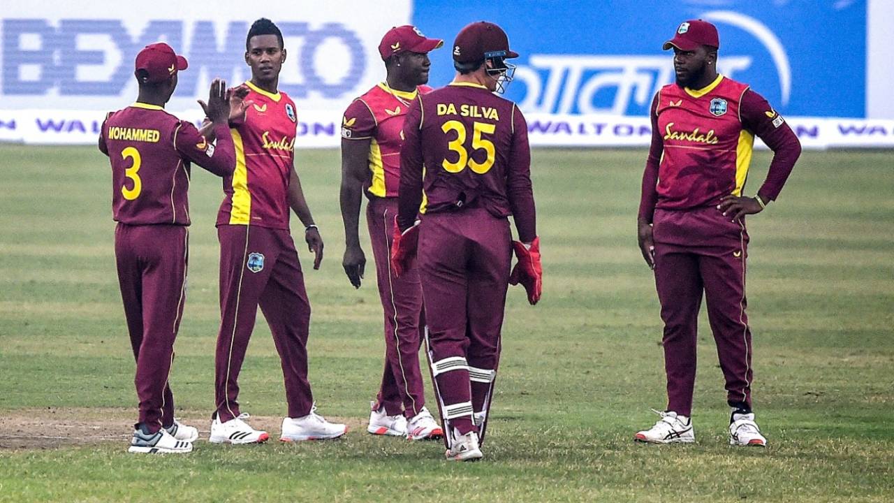 Akeal Hosein celebrates with team-mates after dismissing Liton Das, Bangladesh vs West Indies, 1st ODI, Mirpur, January 20, 2021