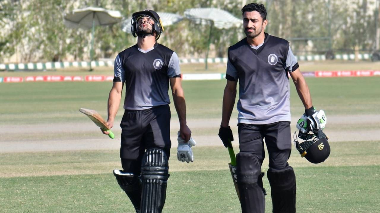 Sahibzada Farhan (left) and Adil Amin (right) walk back after Khyber Pakhtunkhwa's win, Central Punjab vs Khyber Pakhtunkhwa, Pakistan Cup, final, Karachi, January 31, 2021