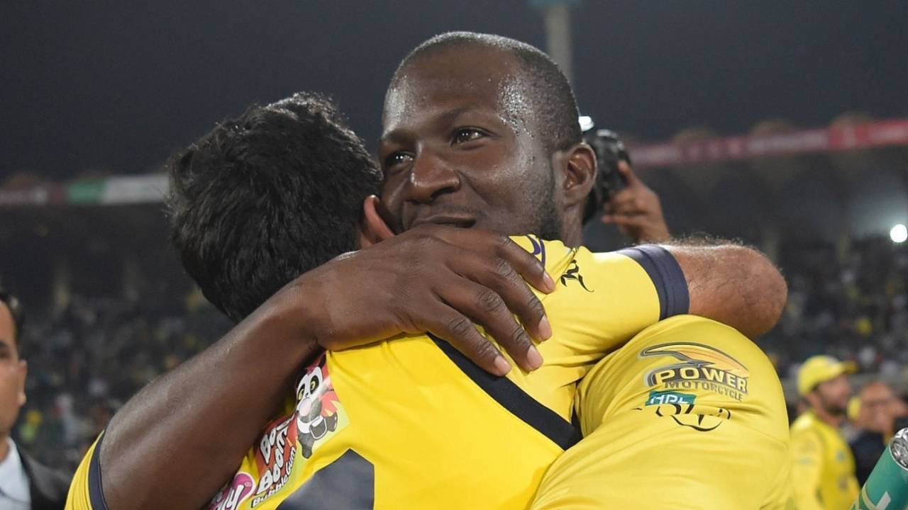 Peshawar Zalmi captain Darren Sammy celebrates with Wahab Riaz after their victory over Quetta Gladiators in the PSL 2017 final, Lahore, March 5, 2017