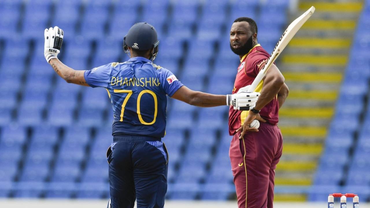 Danushka Gunathilaka gestures to Kieron Pollard that he didn't kick the ball away intentionally, West Indies vs Sri Lanka, 1st ODI, North Sound, March 10, 2021