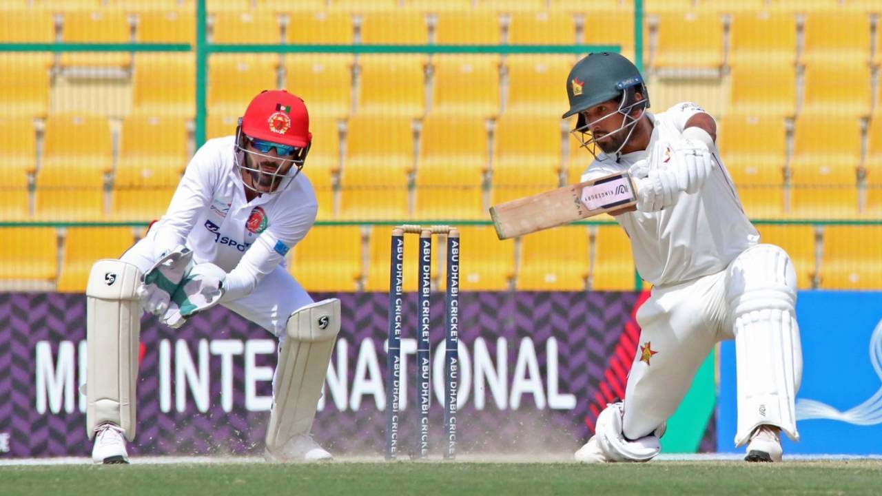 Sikandar Raza gets down on one knee to play a square drive, Afghanistan vs Zimbabwe, 2nd Test, Abu Dhabi, 3rd day, March 12, 2021