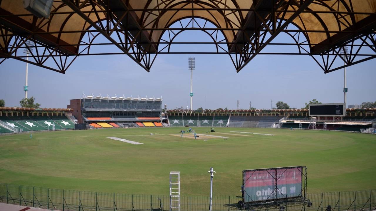 Ground staff prepare the pitch of the Gaddafi Stadium, Lahore, September 7, 2017