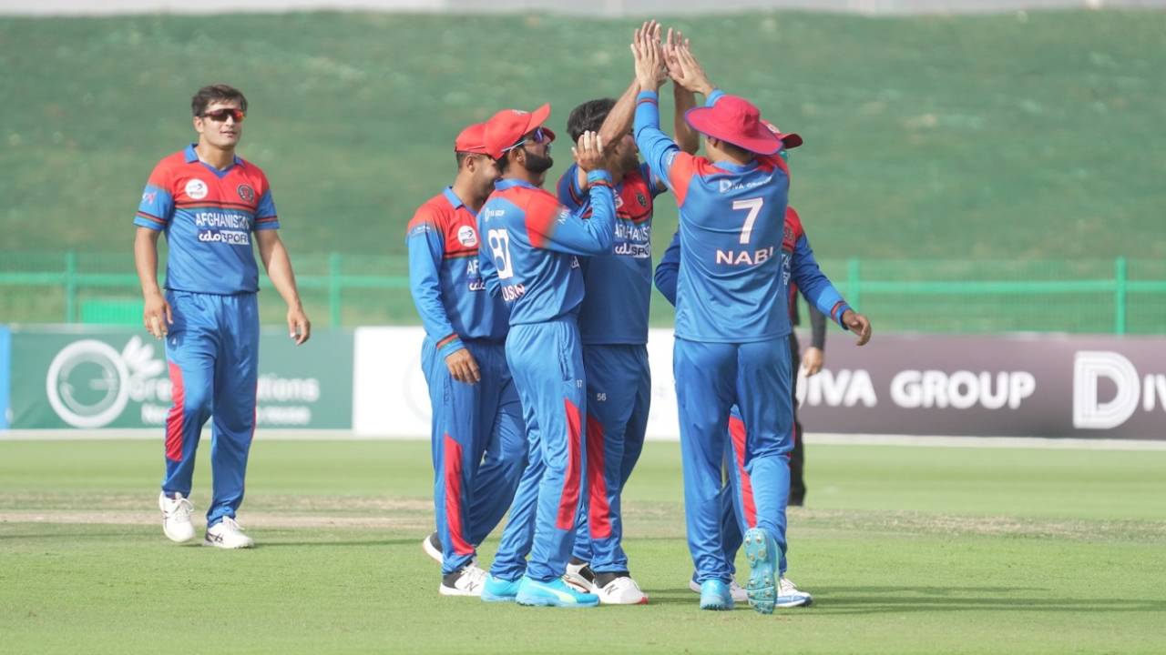 Afghanistan players celebrate a wicket, Afghanistan vs Zimbabwe, 1st T20I, Abu Dhabi, March 17, 2021