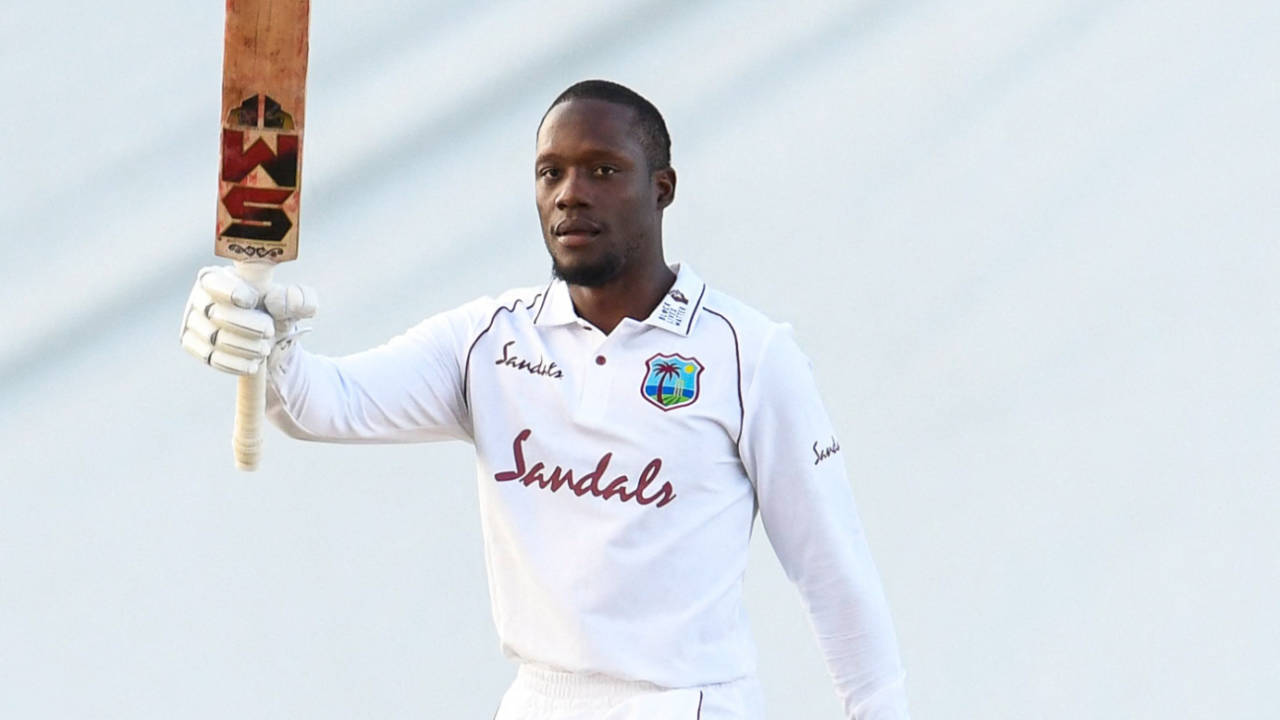 Nkrumah Bonner raises his bat after reaching his maiden Test century, West Indies v Sri Lanka, 1st Test, North Sound, 5th day, March 25, 2021

