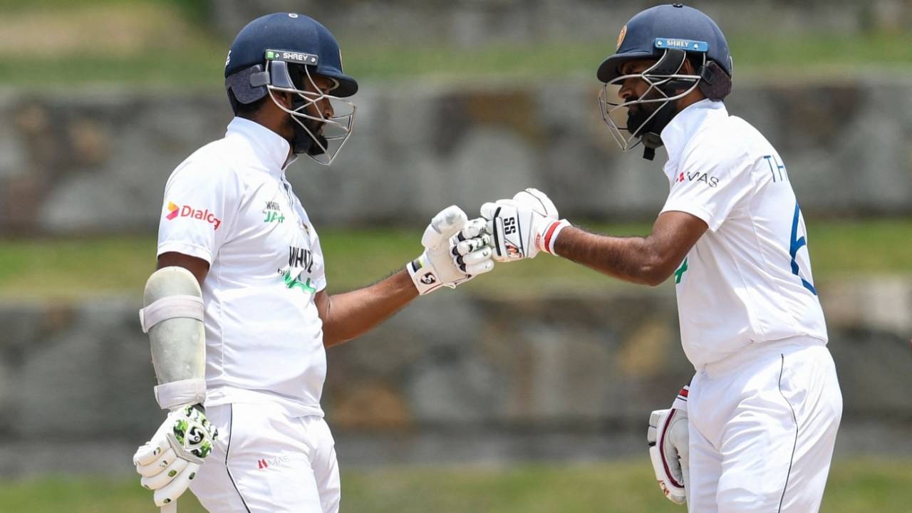 Dimuth Karunaratne and Lahiru Thirimanne bump fists during their partnership, West Indies vs Sri Lanka, 2nd Test, North Sound, 5th day, April 2, 2021