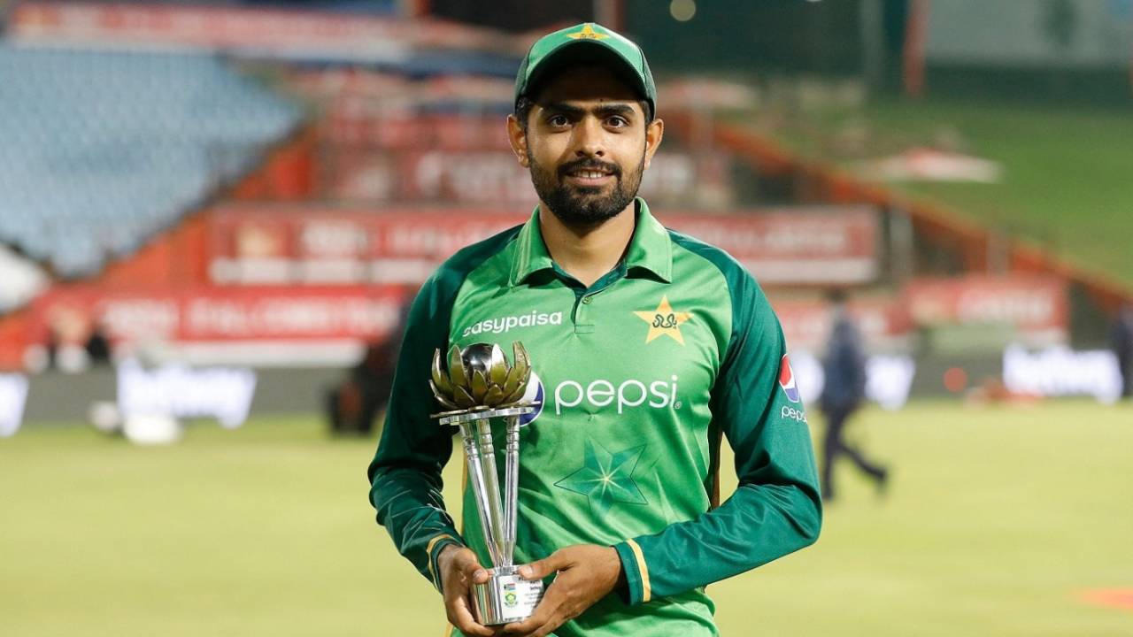 Babar Azam poses with the series trophy&nbsp;&nbsp;&bull;&nbsp;&nbsp;AFP via Getty Images
