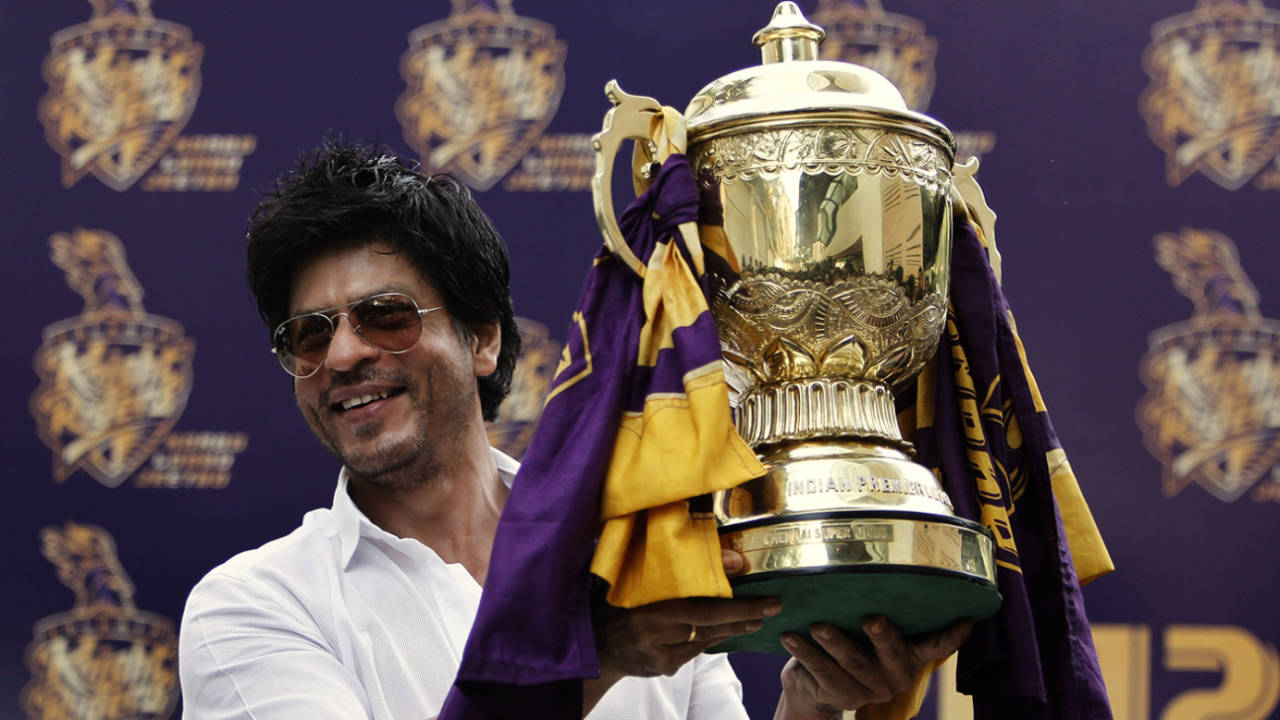 The Kolkata Knight Riders team owner Shah Rukh Khan with their first IPL trophy, Mumbai, May 30, 2012