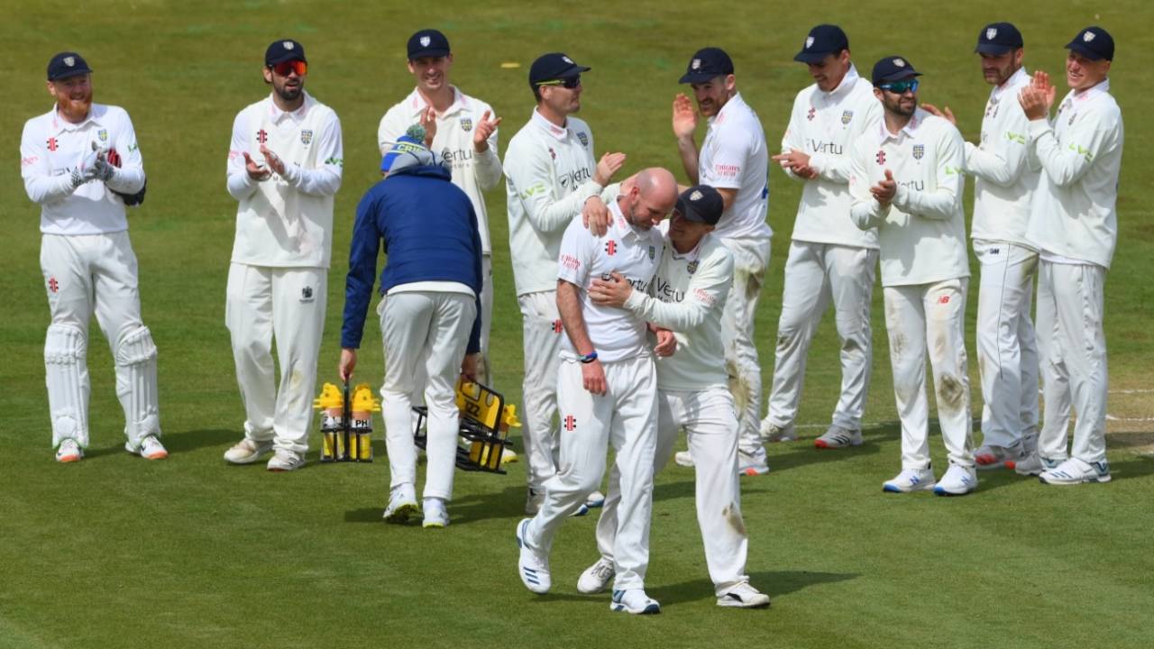 Chris Rushworth takes the applause of his team-mates after becoming Durham's all-time leading wicket-taker&nbsp;&nbsp;&bull;&nbsp;&nbsp;Getty Images
