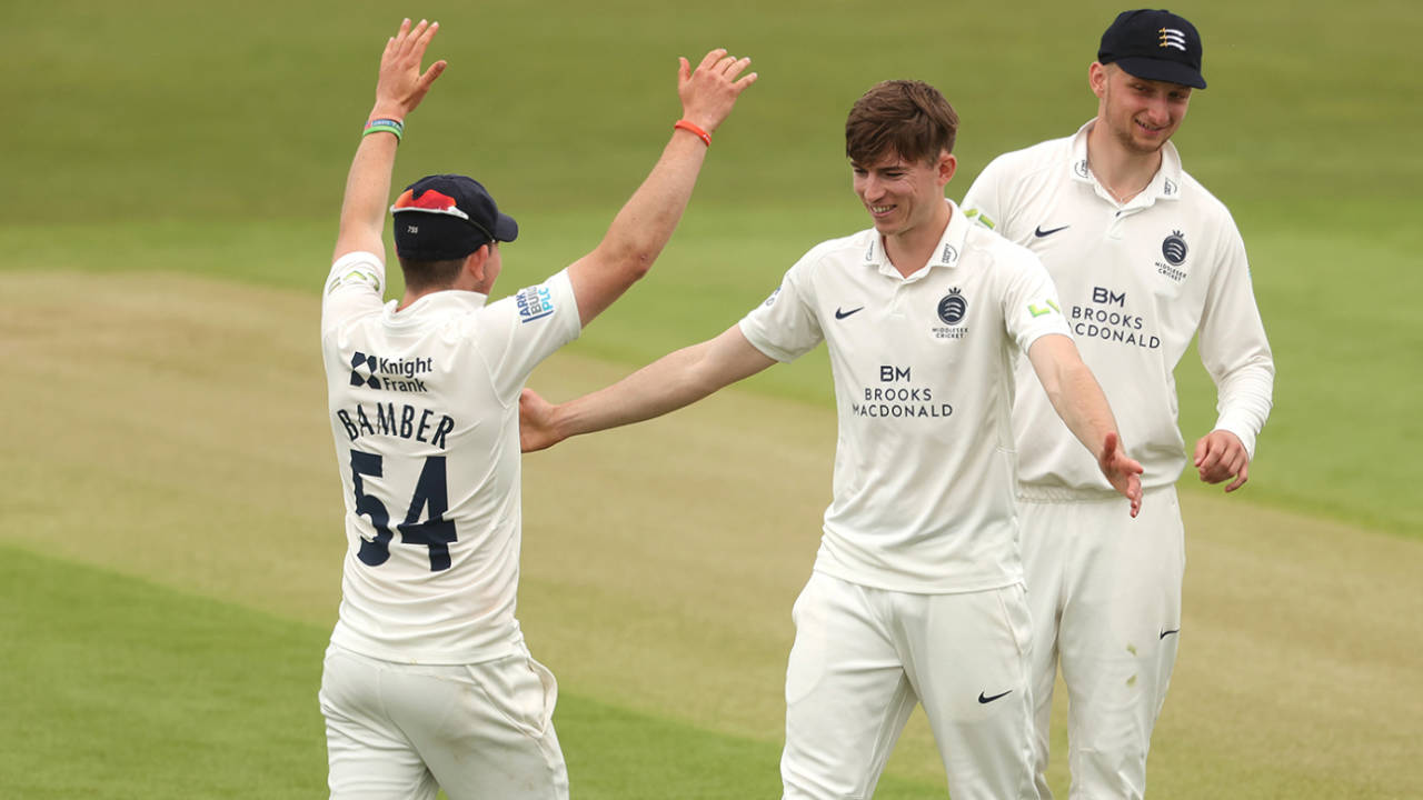 Martin Andersson celebrates with team-mate Ethan Bamber after taking the wicket of Ben Mike, LV= Insurance County Championship, Leicestershire vs Middlesex, day 2, Grace Road, May 28, 2021