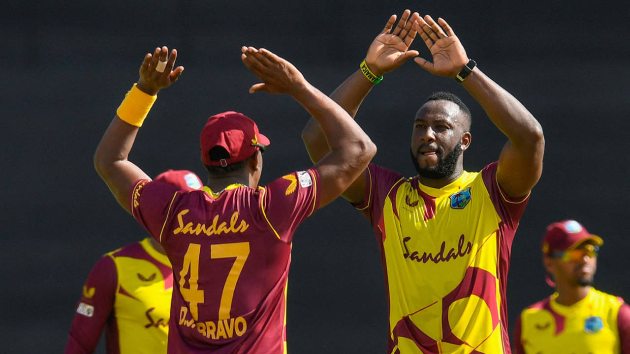 Andre Russell and Dwayne Bravo celebrate, West Indies vs South Africa, 2nd T20I, St George's, June 27, 2021
