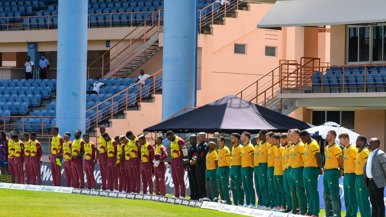 West Indies and South Africa players observe one minute's silence for Goolam Rajah