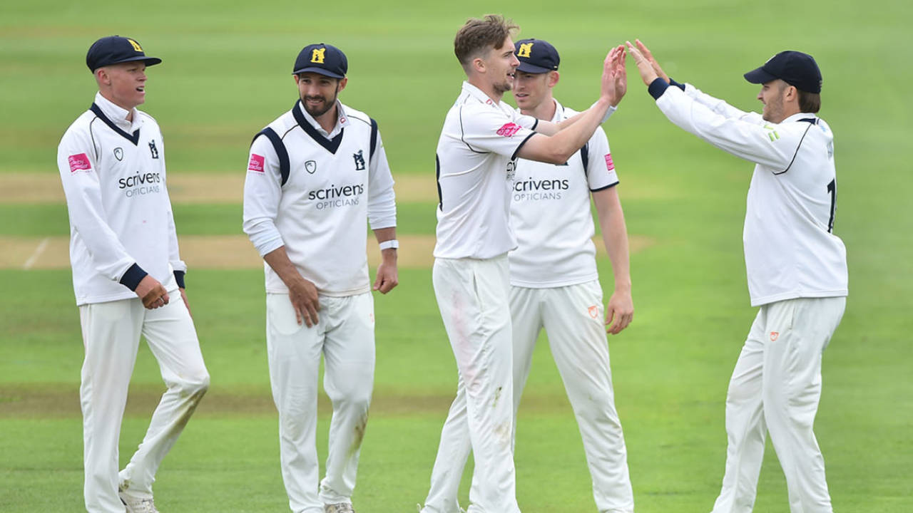 Craig Miles celebrates a wicket with his team-mates, Warwickshire vs Durham, day two, LV= Insurance County Championship, Edgbaston, July 6, 2021
