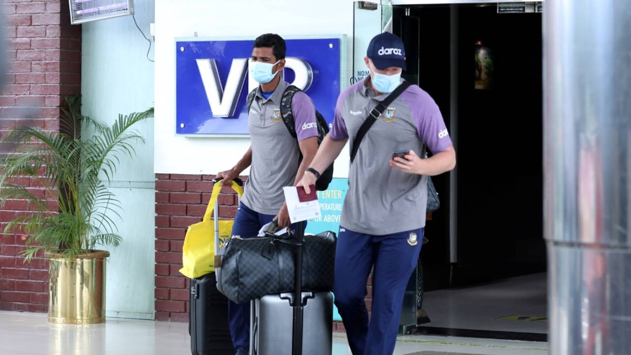 Mahmudullah and Nick Lee, Bangladesh's head of physical performance, arrive in Dhaka after the tour of Zimbabwe