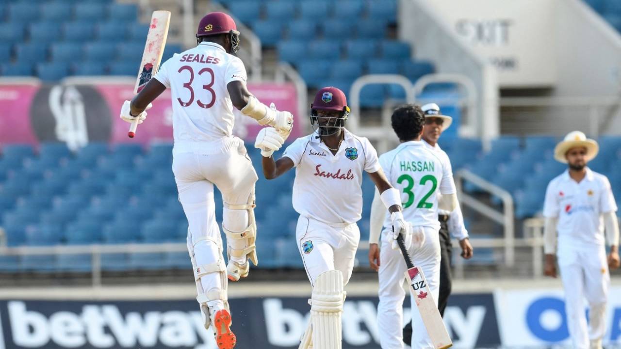 Jayden Seales and Kemar Roach bump fists after the winning runs, West Indies vs Pakistan, 1st Test, Kingston, 4th day, August 15, 2021
