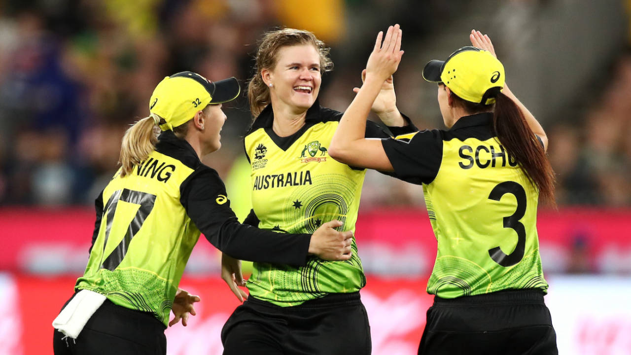 Jess Jonassen celebrates a wicket with Meg Lanning and Megan Schutt, Melbourne,  March 8, 2020