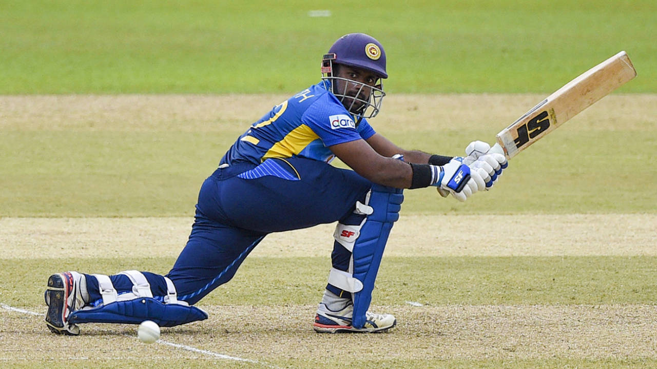 Charith Asalanka stretches out to sweep, Sri Lanka vs South Africa, 1st ODI, Colombo, September 2, 2021