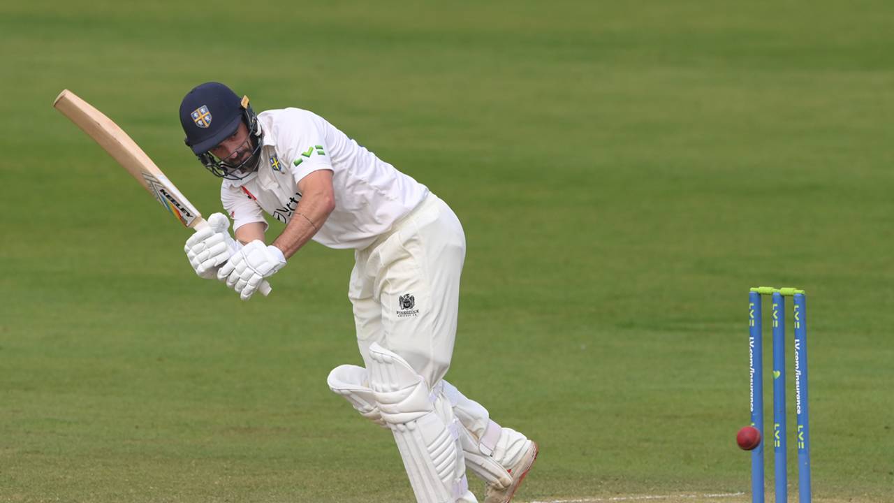Ned Eckersley clips to leg during his half-century