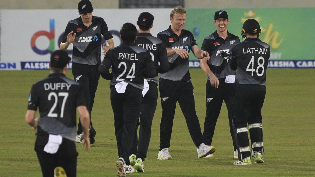 Scott Kuggeleijn is mobbed by his team-mates, Bangladesh v New Zealand, 5th T20I, Dhaka, September 10, 2021
