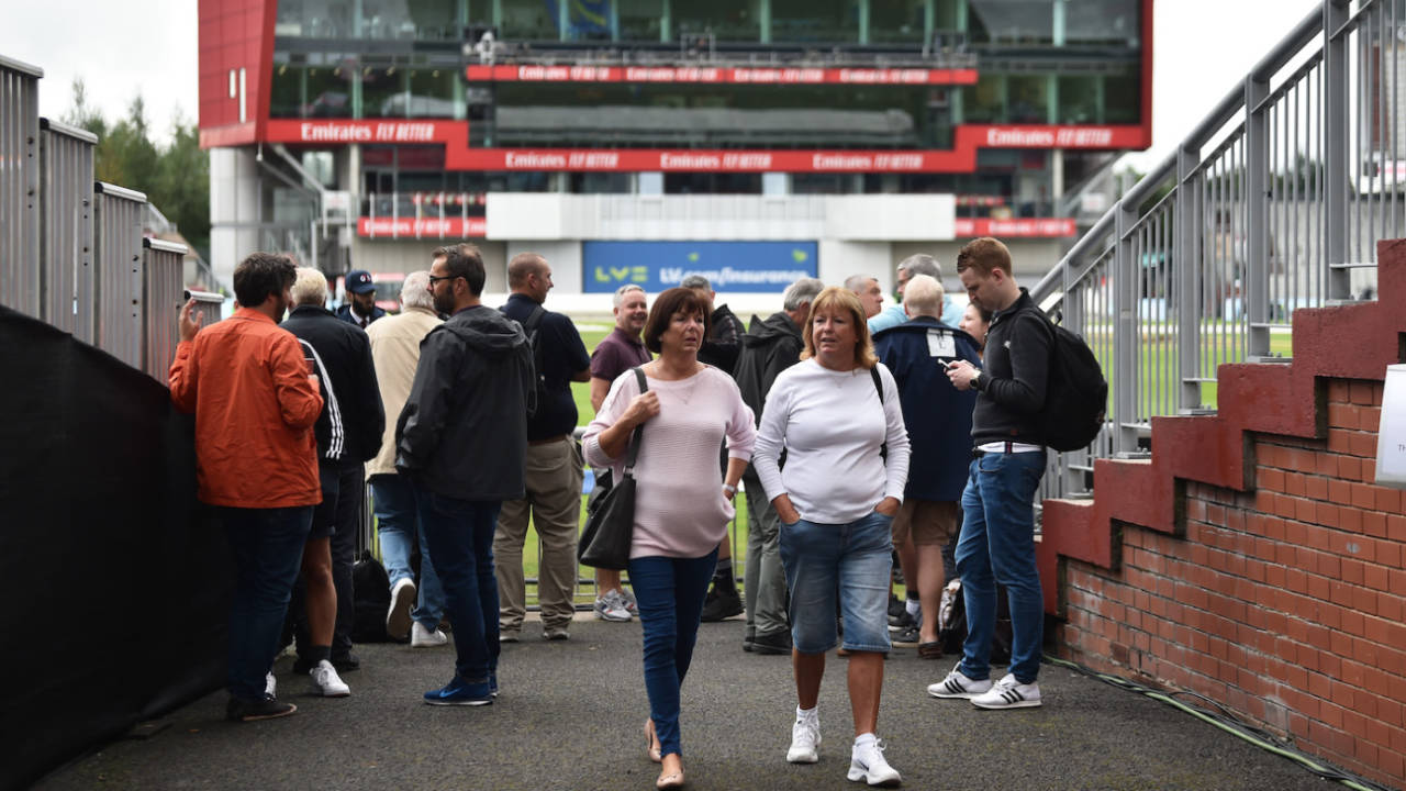 Spectators leave Old Trafford after news of the cancellation, England vs India, 5th Test, Manchester, 1st day, September 10, 2021