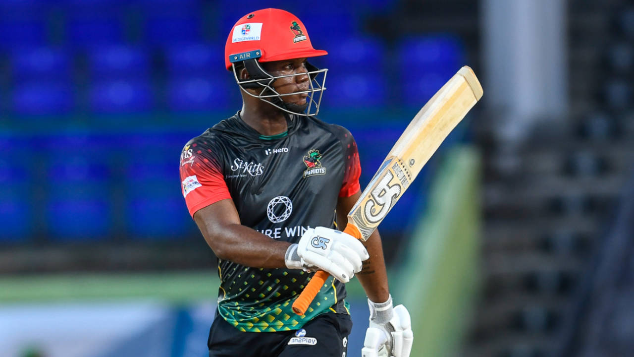 Evin Lewis raises his bat after blazing to a half-century, St Kitts & Nevis Patriots v Guyana Amazon Warriors, CPL 2021, 2nd semi-final, Basseterre, September 14, 2021