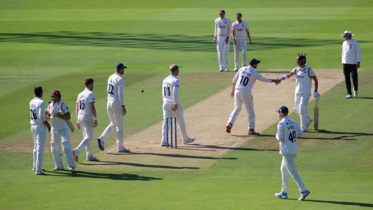 Essex and Northamptonshire shake hands at the end of the shortest County Championship four-day fixture, Essex vs Northamptonshire, County Championship, 2nd day, Chelmsford, September 22, 2021