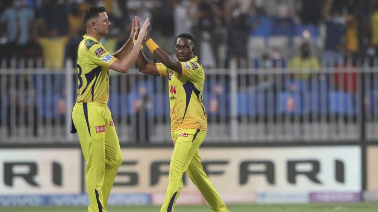 Josh Hazlewood and Dwayne Bravo high five after the latter snags Virat Kohli, Royal Challengers Bangalore vs Chennai Super Kings, IPL 2021, Sharjah, September 24, 2021
