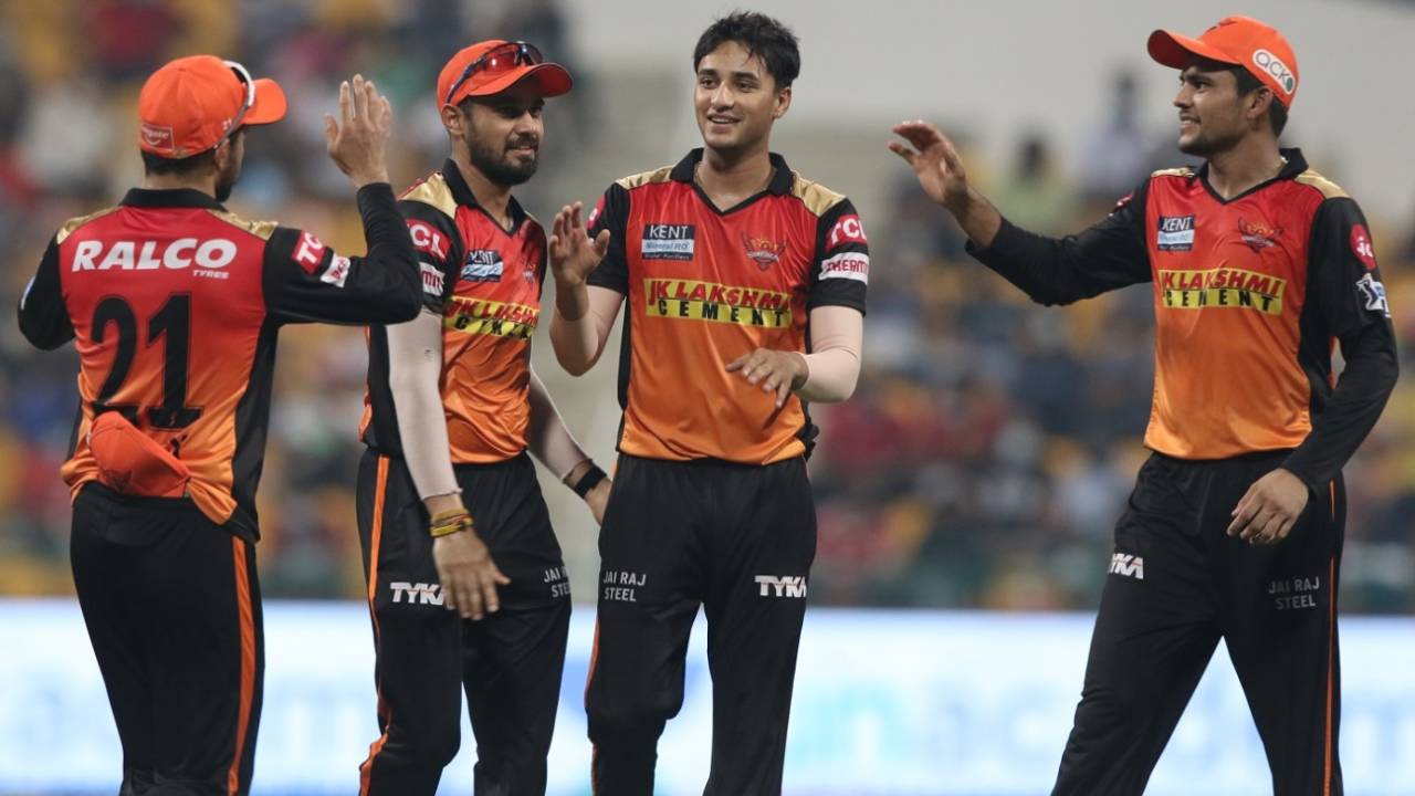 Abhishek Sharma at the centre of a happy bunch of SRH players after taking two in two, Sunrisers Hyderabad vs Mumbai Indians, IPL 2021, Abu Dhabi, October 8, 2021