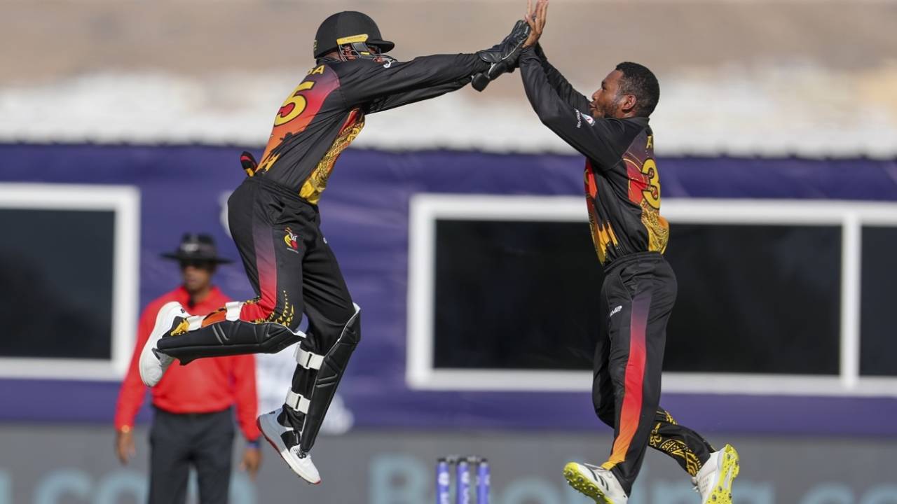 Kiplin Doriga and Simon Atai celebrate a wicket, Papua New Guinea vs Scotland, T20 World Cup, Al Amerat, October 19, 2021